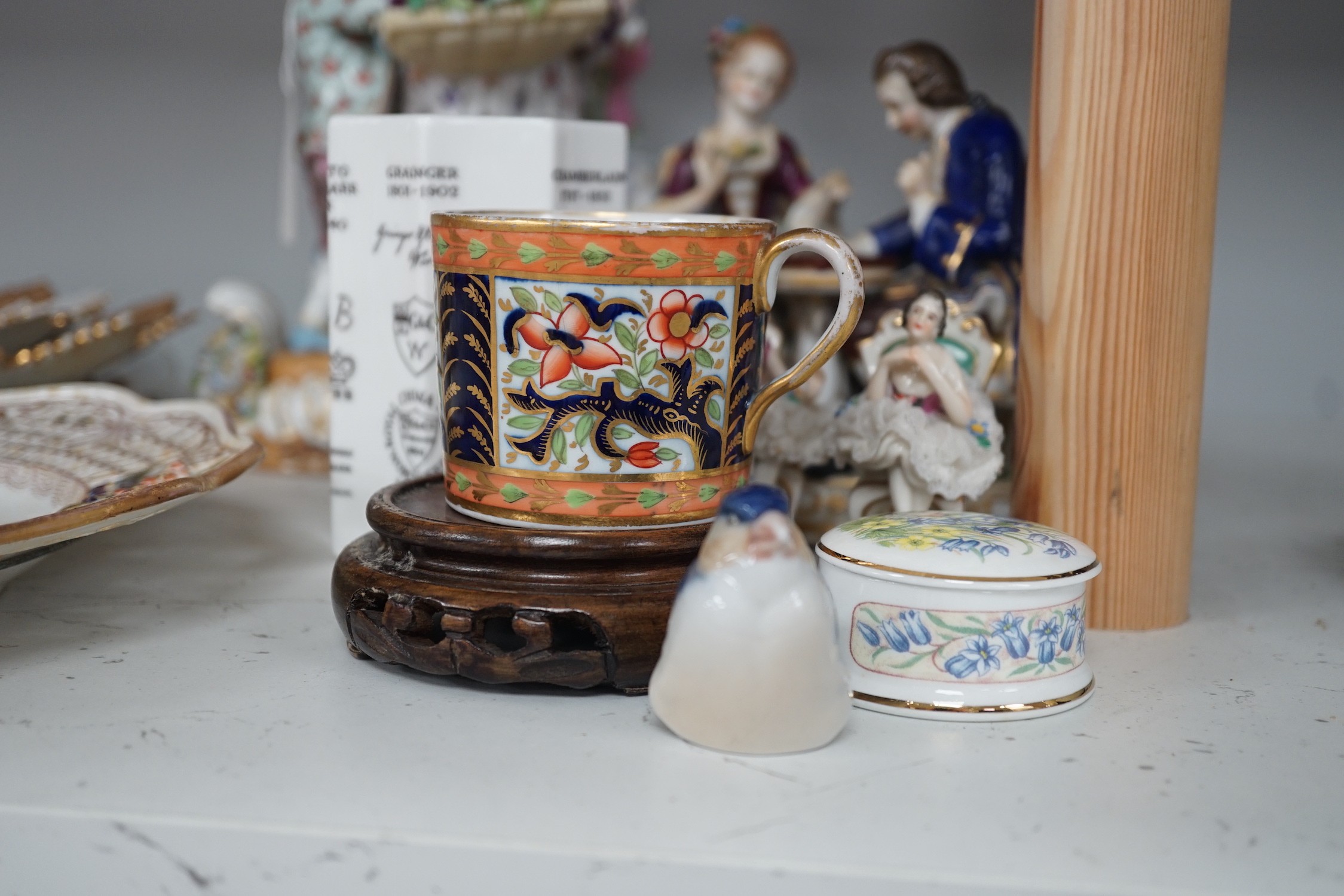 Two Meissen leaf dishes, a Dresden plate, two group figures and mixed ceramics, tallest 25cms high